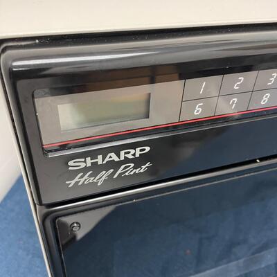 LOT 404.  SHARP HALF PINT MICROWAVE OVEN