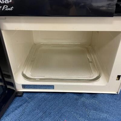 LOT 404.  SHARP HALF PINT MICROWAVE OVEN