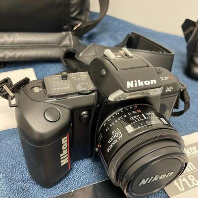 LOT 405. NIKON 4004 CAMERA WITH AF NIKKOR 50MM