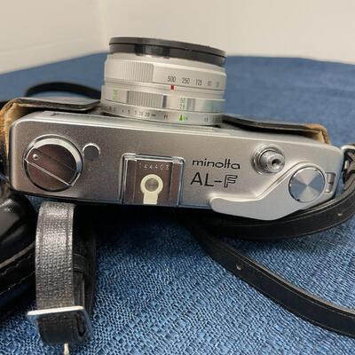 LOT 406. MINOLTA AL-F VINTAGE CAMERA WITH LEATHER CASE