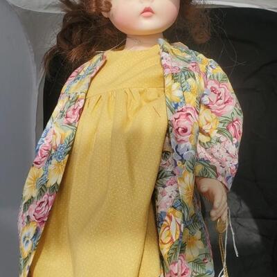 Doll in yellow dress