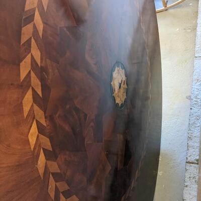 6 Ft Diameter  Inlaid wood Table, Four Carved Leg Base