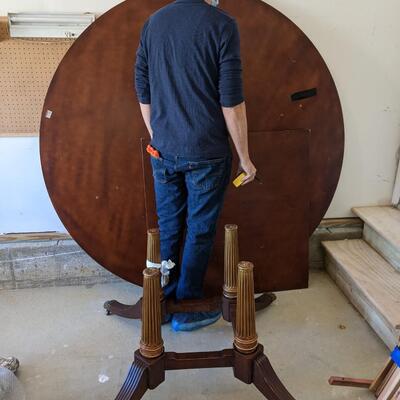 6 Ft Diameter  Inlaid wood Table, Four Carved Leg Base
