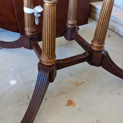 6 Ft Diameter  Inlaid wood Table, Four Carved Leg Base