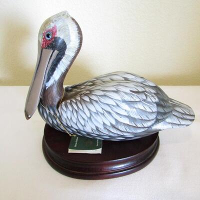 LOT 6  BROWN WOODEN PELICAN BY JOHN MADISON