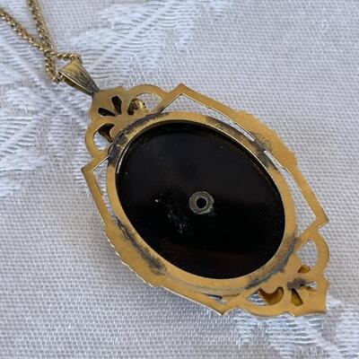 VINTAGE MOURNING JEWELRY BLACK GLASS & GOLD TONE PENDANT FLORAL CENTER