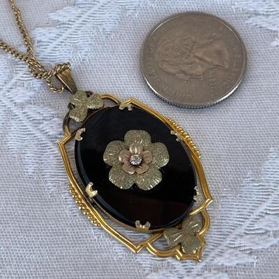 VINTAGE MOURNING JEWELRY BLACK GLASS & GOLD TONE PENDANT FLORAL CENTER