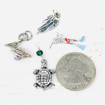 GROUP OF 4 OCEAN THEME STERLING SILVER CHARMS