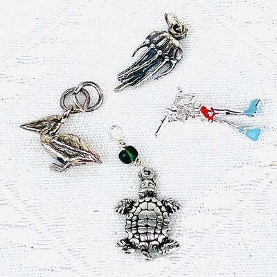 GROUP OF 4 OCEAN THEME STERLING SILVER CHARMS