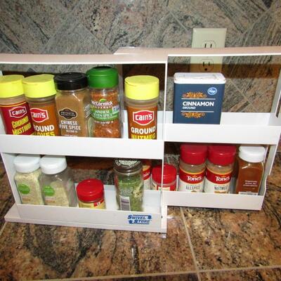 LOT 49  CUPBOARD SPICE RACK AND SPICES