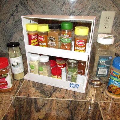 LOT 49  CUPBOARD SPICE RACK AND SPICES