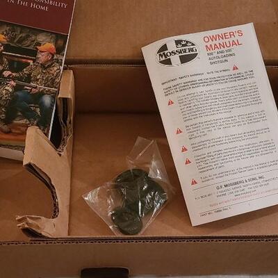 Firearm: Mossberg 12 gauge Matte Black Finish Includes all original documents & packaging