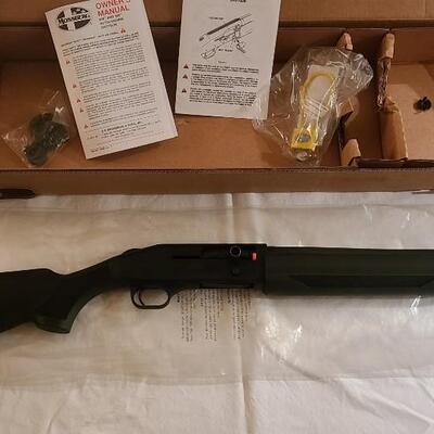 Firearm: Mossberg 12 gauge Matte Black Finish Includes all original documents & packaging