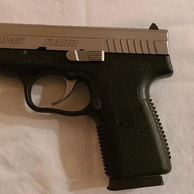 Firearm: KAHR PM45 45 caliber ACP All documents & case are present