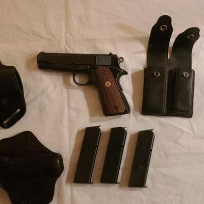 Firearm: Colt Combat Commander .45 cal automatic