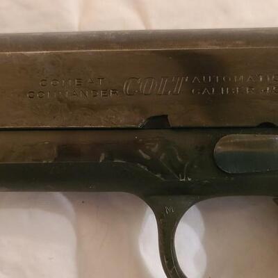 Firearm: Colt Combat Commander .45 cal automatic