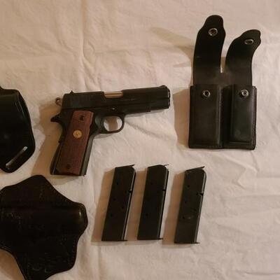 Firearm: Colt Combat Commander .45 cal automatic