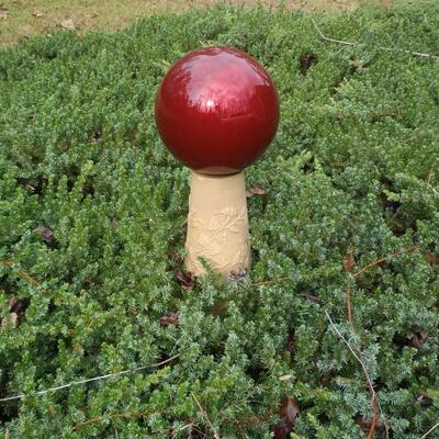 Red Gazing ball on stand