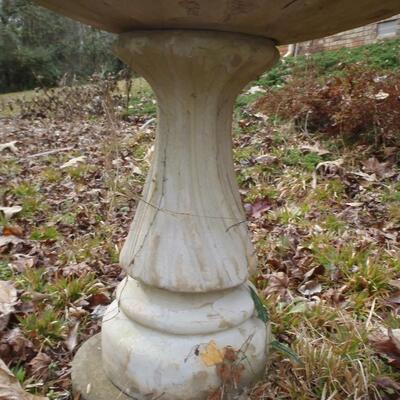 Concrete bird bath, pointed edges