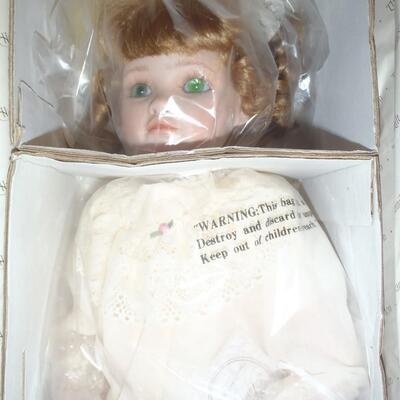 New in box; "Amelia" Porcelain Doll; Hamilton Collection