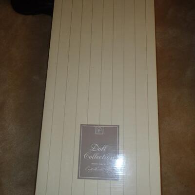 New in box; "Chelsea" Porcelain Doll