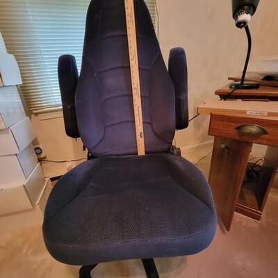 blue rolling desk chair with side arms