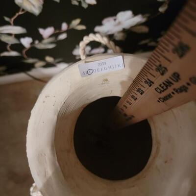 large off white vase with ropes