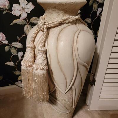 large off white vase with ropes
