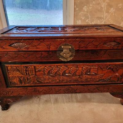 engraved wooden chest