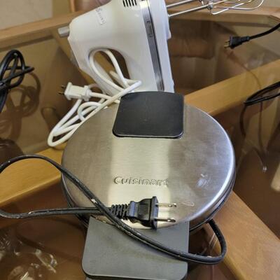 3 items...toaster toaster, waffle iron, and hand mixer