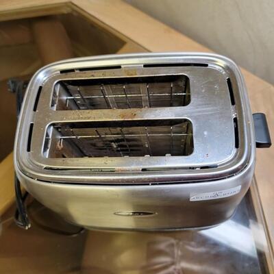 3 items...toaster toaster, waffle iron, and hand mixer