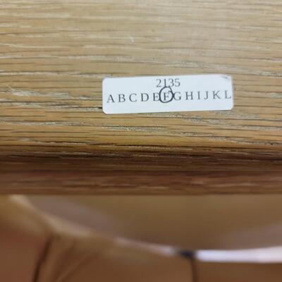 glass octagon table with 4 rolling camel colored chairs