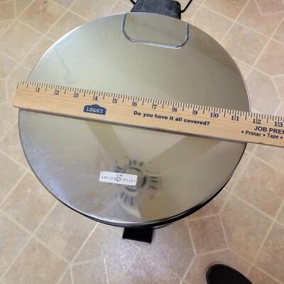 round silver trash can