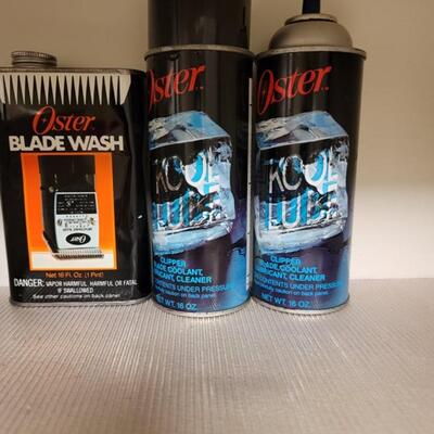 oster hair clipper lot with lots of attachments