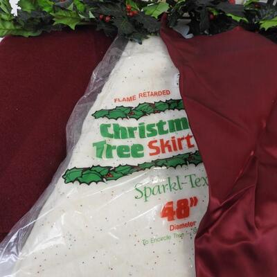Christmas lot: 3 tree skirts, trees, nativity kit, tins, garland, door hanger