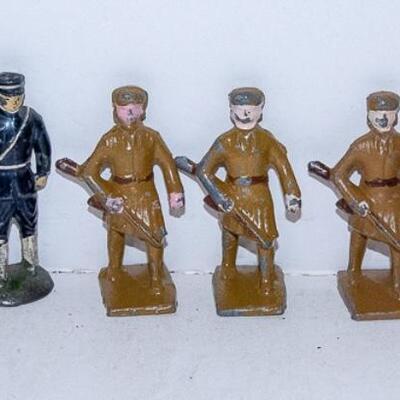 Group of NINE Cast Lead Soldier Figurines