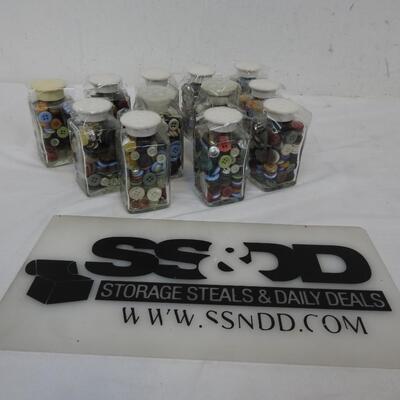 12 Small Bottles of Different Buttons