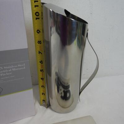 MoDRN Industrial Stainless Steel Asymmetrical Mirrored Water Pitcher. Used