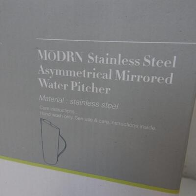 MoDRN Industrial Stainless Steel Asymmetrical Mirrored Water Pitcher. Used