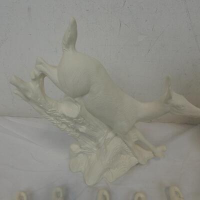White Ceramic Christmas: Ten Santas with Beards, Reindeer, Big Santa with Torch