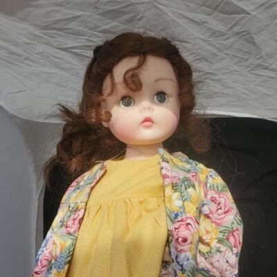 Doll in yellow dress