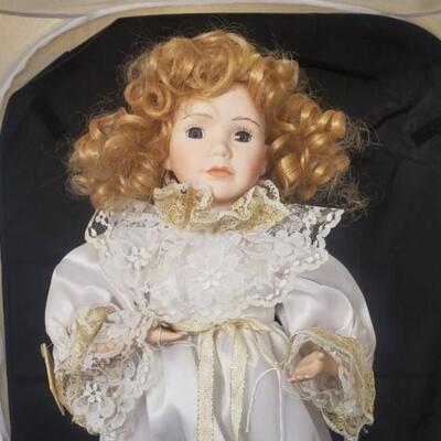 Doll in white and Gold Dress