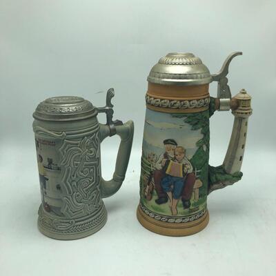 Two Norman Rockwell Steins (B-MG)