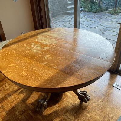Beautiful round claw foot oak pedestal table