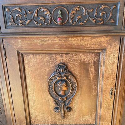 Antique buffet with detailed carvings