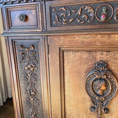 Antique buffet with detailed carvings
