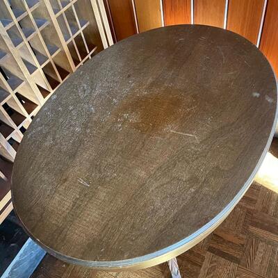 Oval harp pedestal table