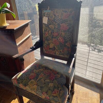 European dining table with carved base, two side chair and 8 dining chairs with nailhead trim