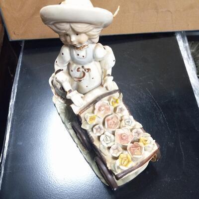 Vintage Girl With a flower cart Figurine