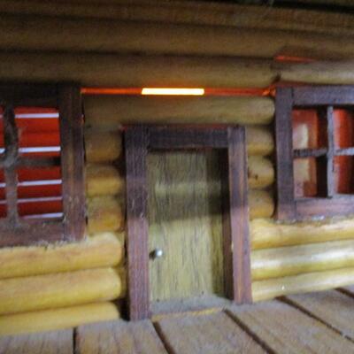 Log Cabin With Light Fixture